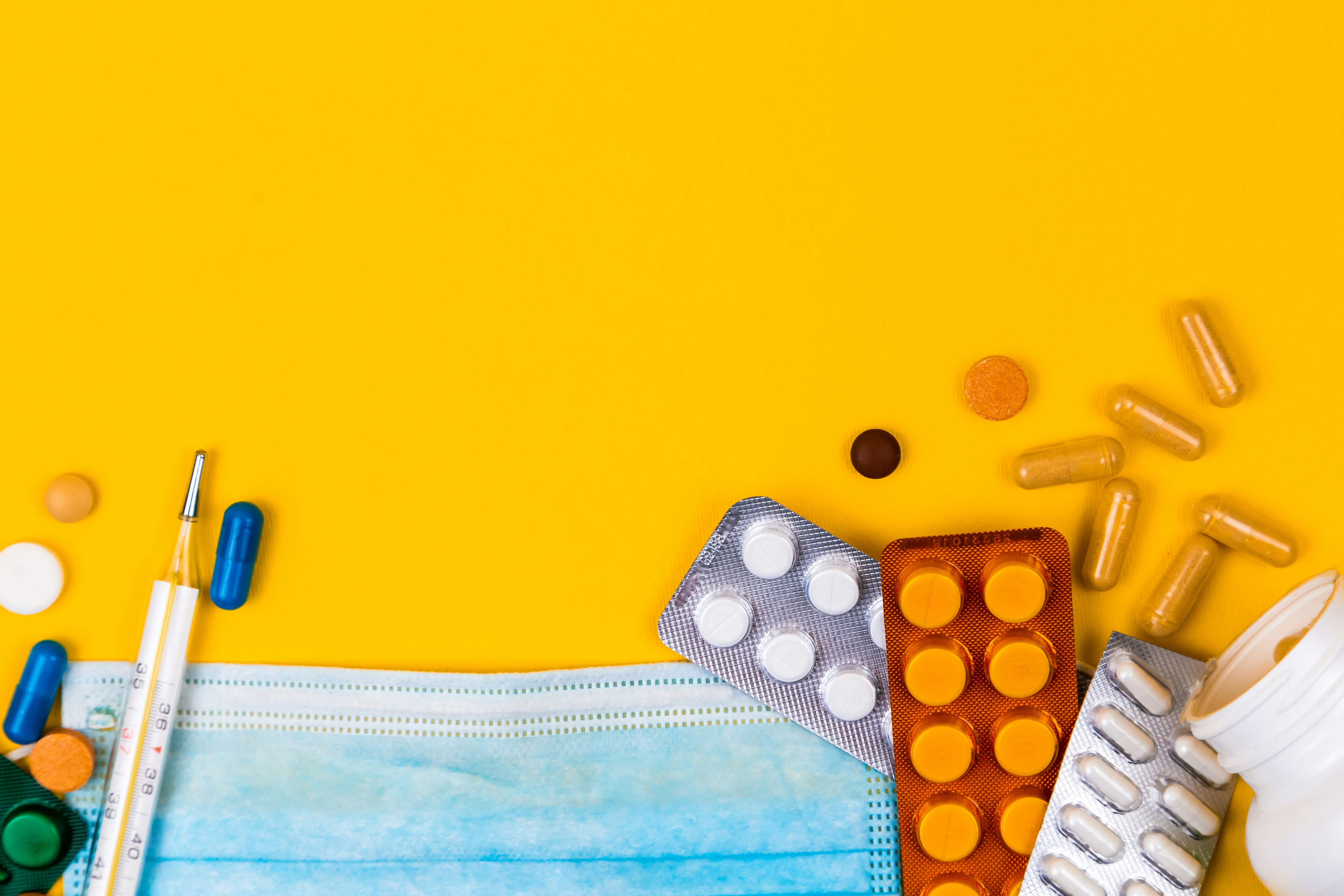 Medications and medical supplies representing the daily reality of chronic illness management
